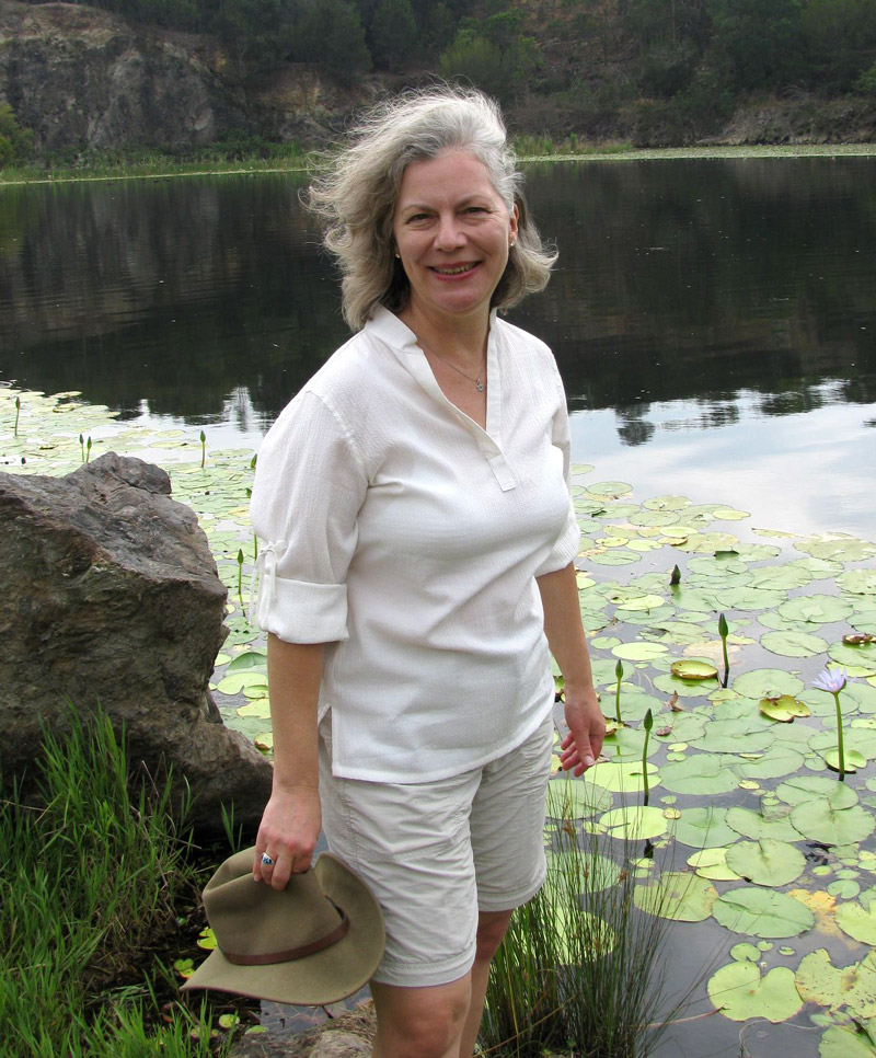 Sylvia Olney in front of a pond
